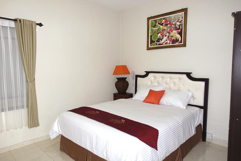Oyo 734 Tuban Torres Accomodation Kuta Lombok Rom bilde