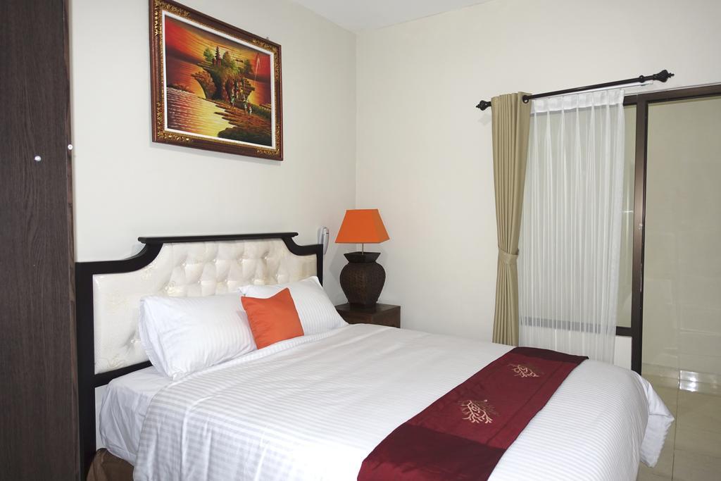 Oyo 734 Tuban Torres Accomodation Kuta Lombok Rom bilde